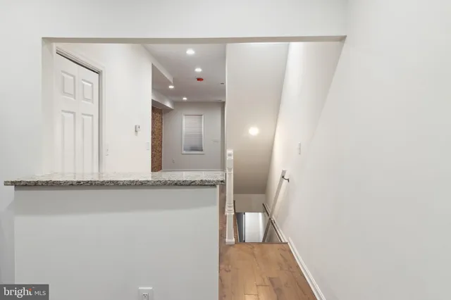 a view of a bathroom sink and a mirror