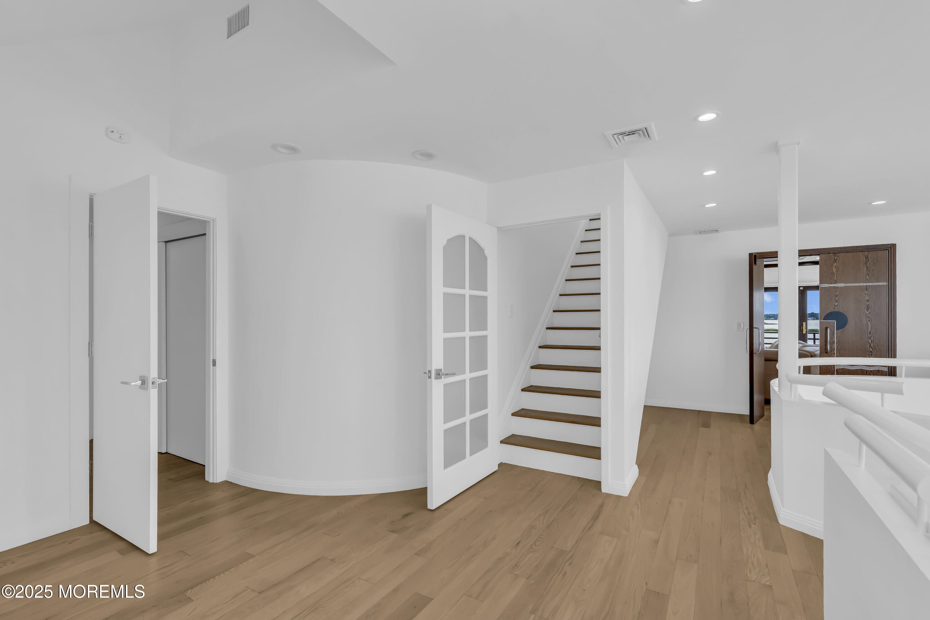 1 Island View Way Sea Bright, NJ 07760 - Photo 45 of 79 a view of a kitchen with wooden floor and stairs