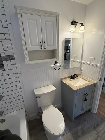 a view of a door and a window