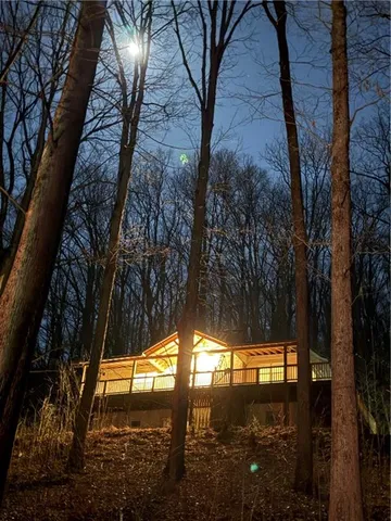 a kitchen with a sink stove top oven and microwave