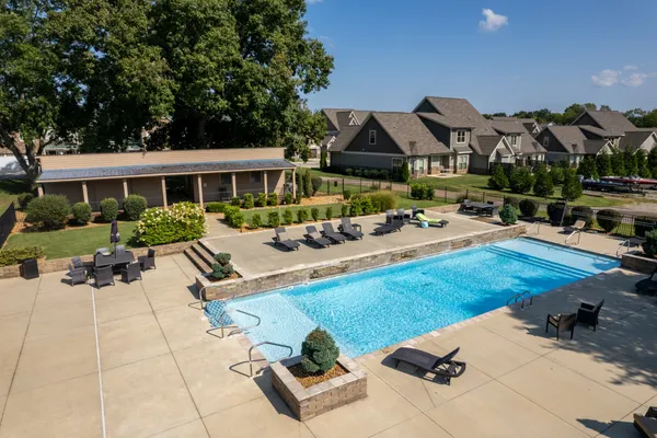 a view of a yard with furniture