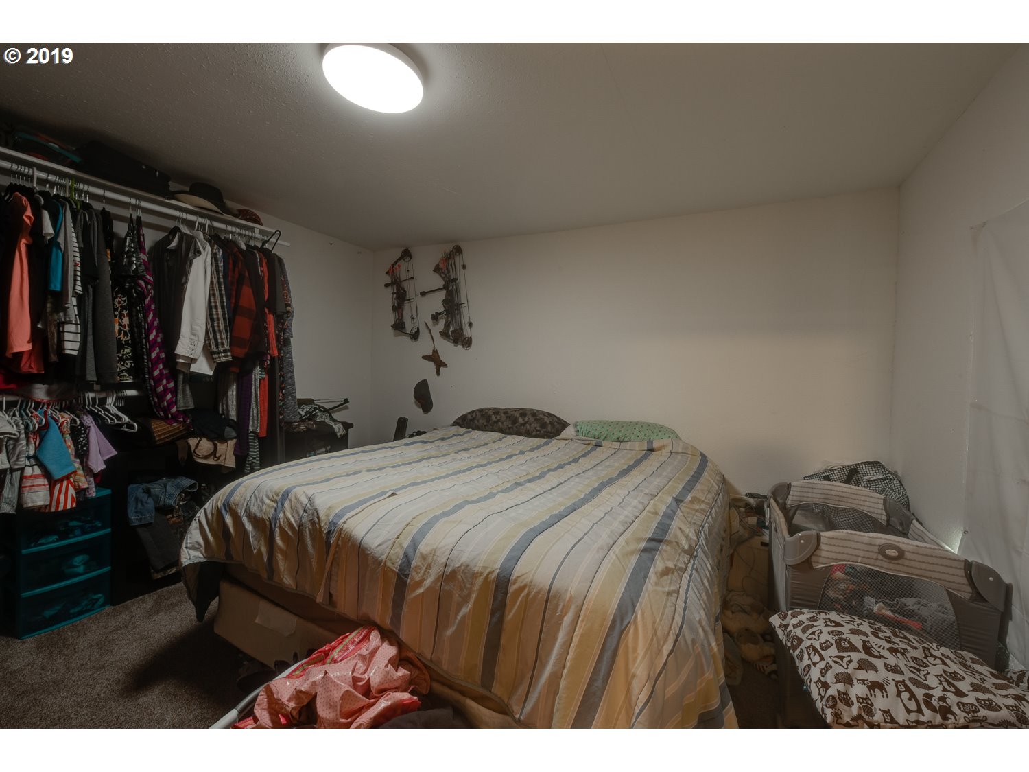 20188 South Redland Road Oregon City, OR 97045 - Photo 11 of 31 a bedroom with a bed and a mirror