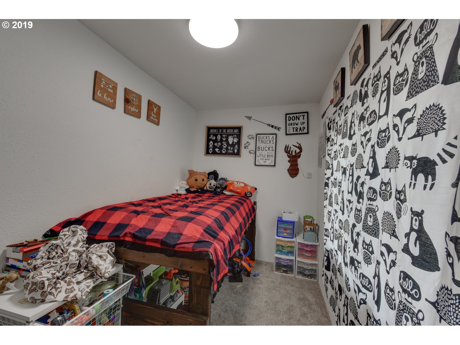 20188 South Redland Road Oregon City, OR 97045 - Photo 12 of 31 a bedroom with a bed and a painting on the wall