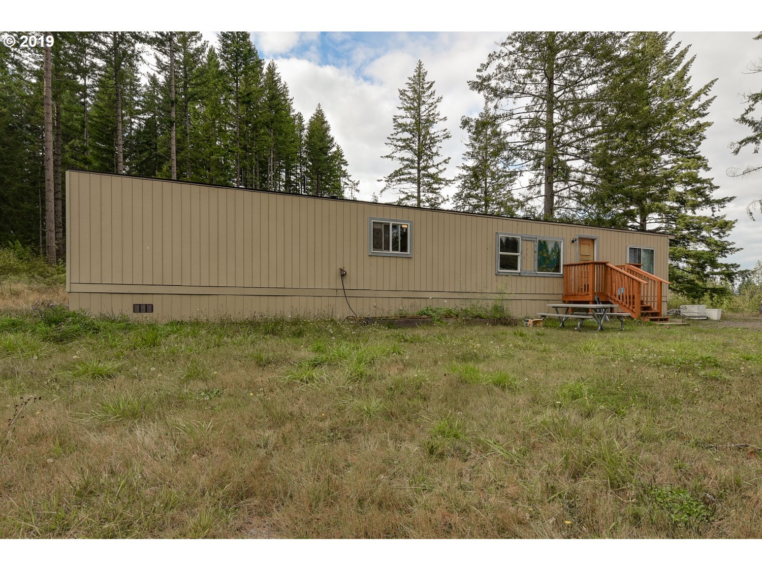 20188 South Redland Road Oregon City, OR 97045 - Photo 4 of 31 a view of a backyard