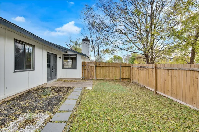 a bathroom with a sink and a yard