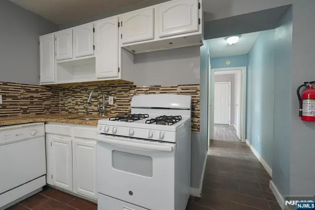 a bathroom with a sink a toilet and bathtub