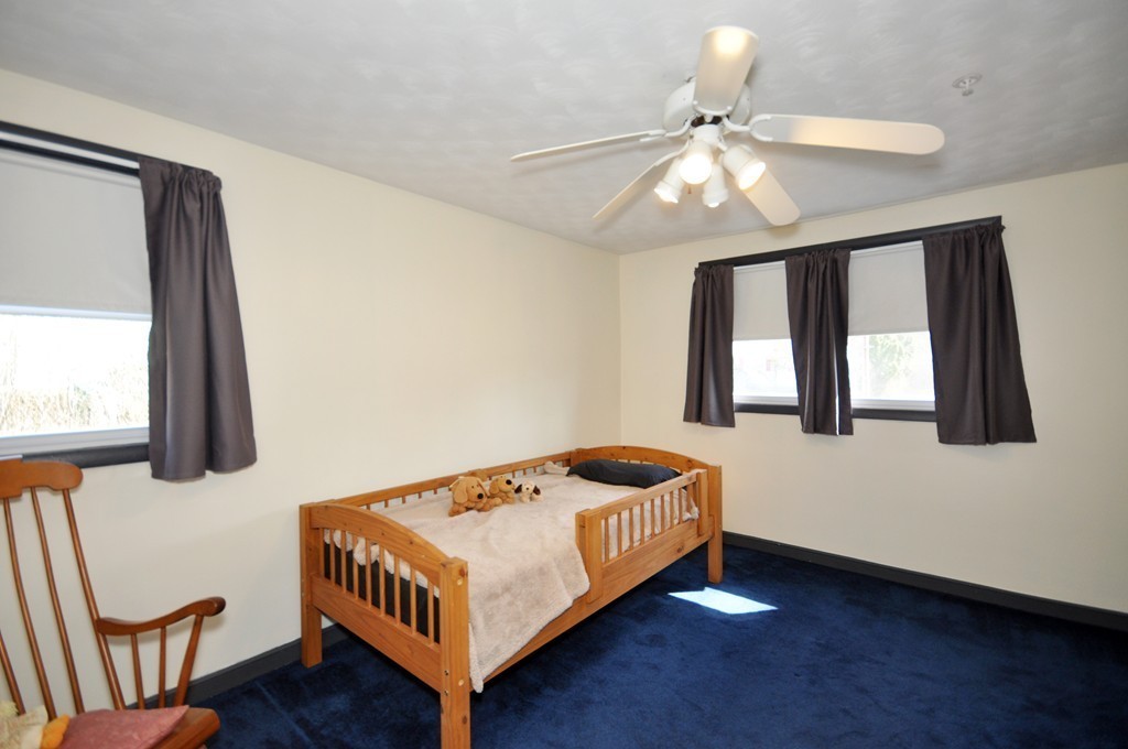 23 Wesson Road Ashland, MA 01721 - Photo 15 of 24 a bedroom with a bed and window