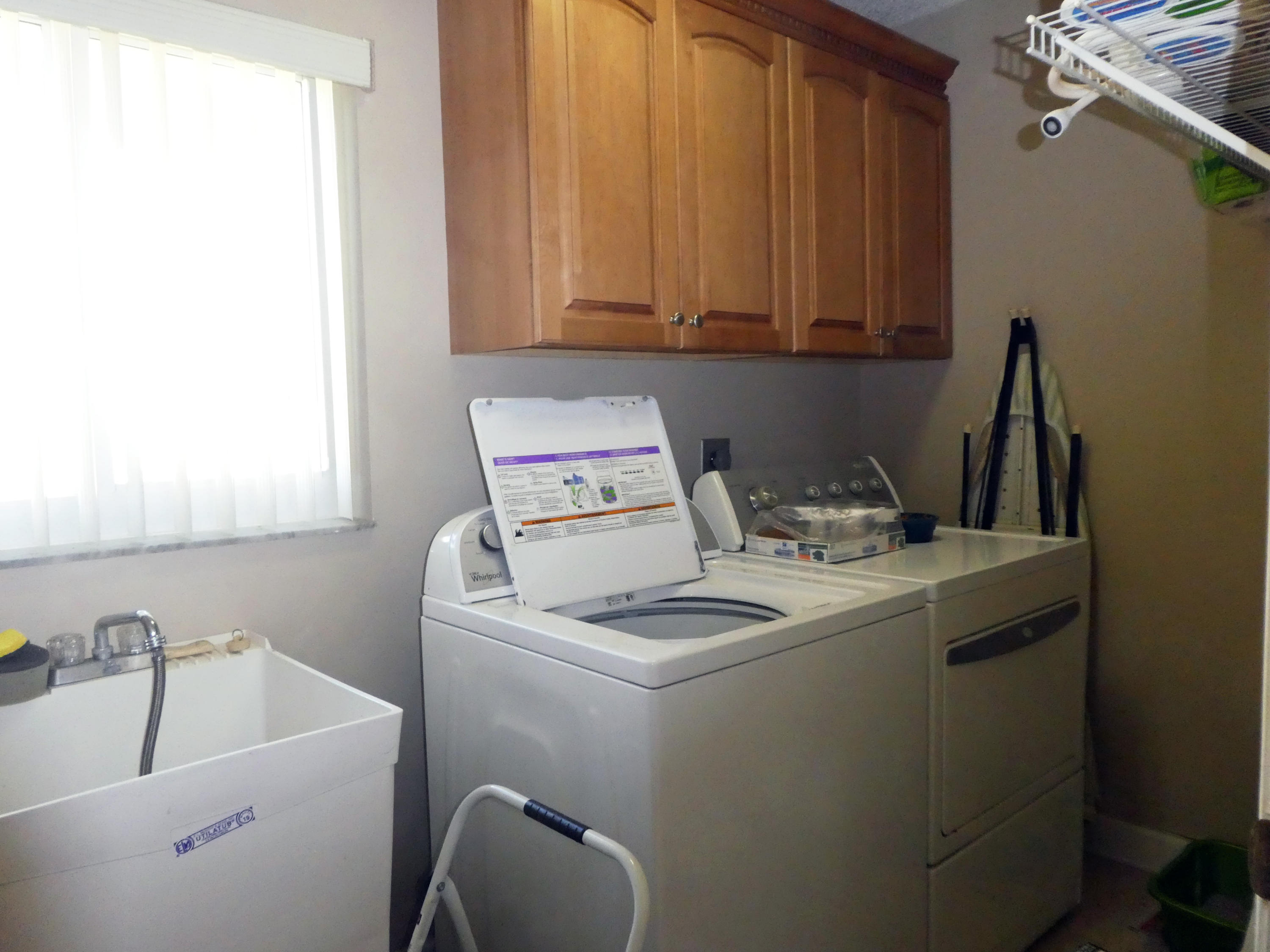 17670 Woodview Terrace Boca Raton, FL 33487 - Photo 14 of 24 a utility room with dryer and washer