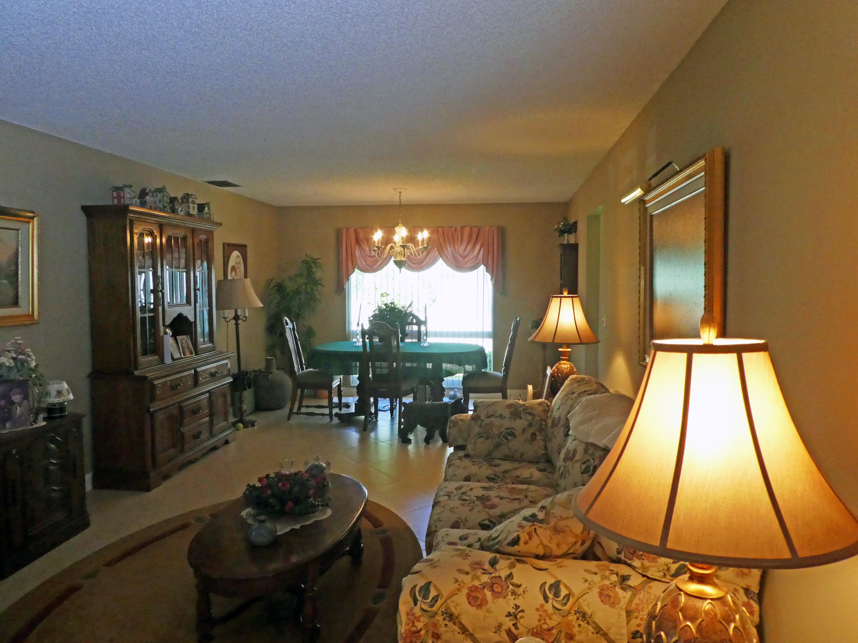 17670 Woodview Terrace Boca Raton, FL 33487 - Photo 3 of 24 a living room with furniture