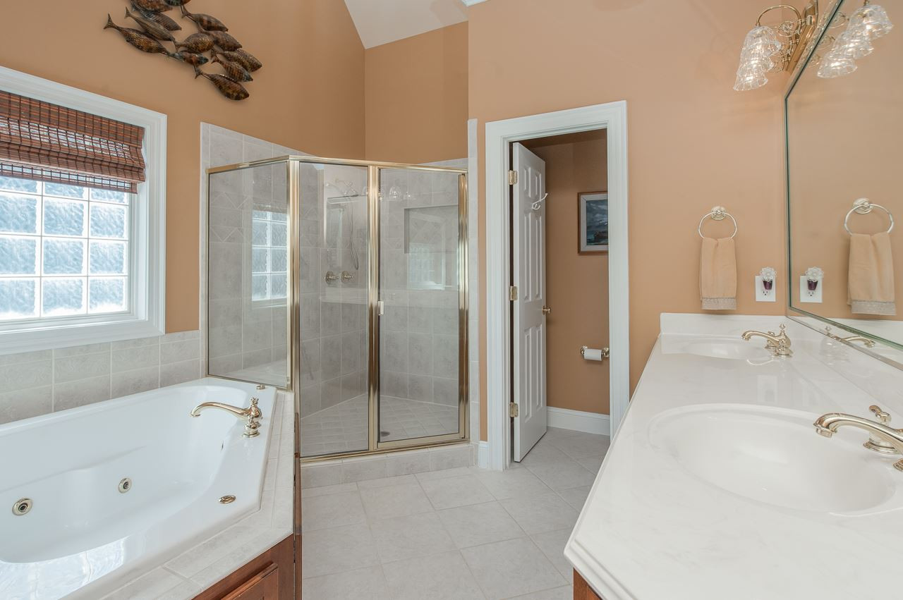 5212 Tallowtree Drive Raleigh, NC 27613 - Photo 13 of 25 Not sure if you are a shower or bath person so I have both Master Bath/Spa
