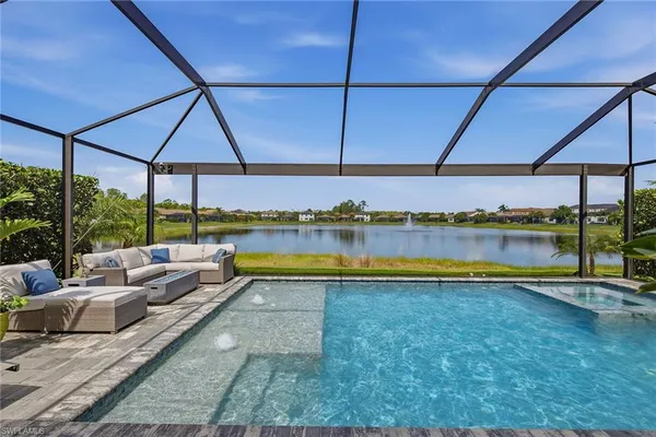 a view of swimming pool with a patio