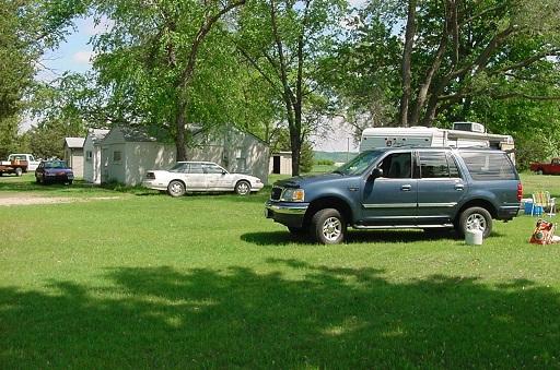 7369 Riverview Road Thomson, IL 61285 - Photo 5 of 6 a view of a car parked in front of a house