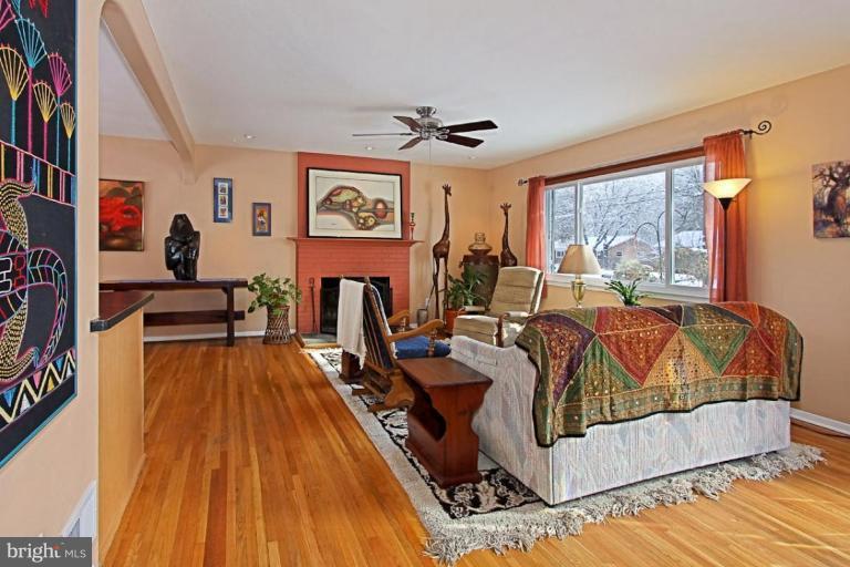 5628 Heming Avenue Springfield, VA 22151 - Photo 4 of 30 a living room with furniture and a wooden floor
