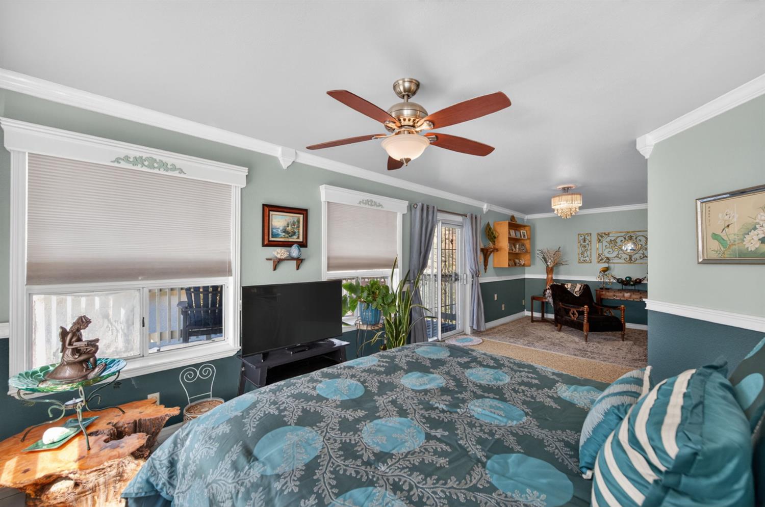 28037 Sky Harbour Road Friant, CA 93626 - Photo 16 of 40 a bedroom with furniture and a large window