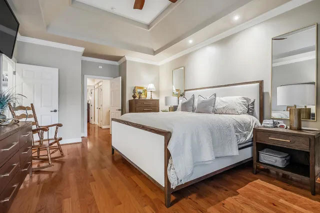 a bed room with a bed and a table