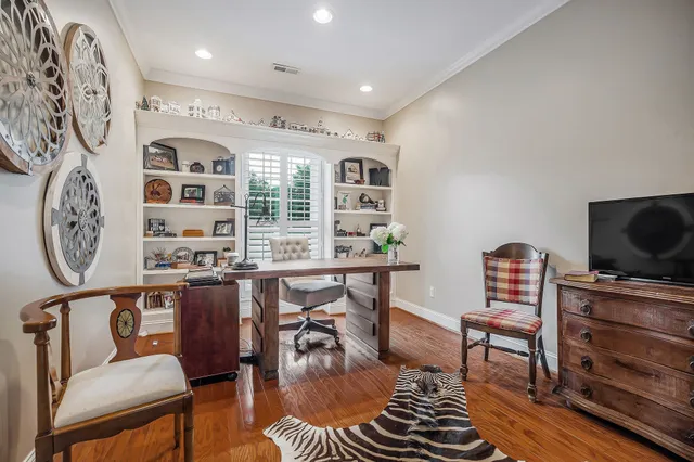 a kitchen with a stove and a sink