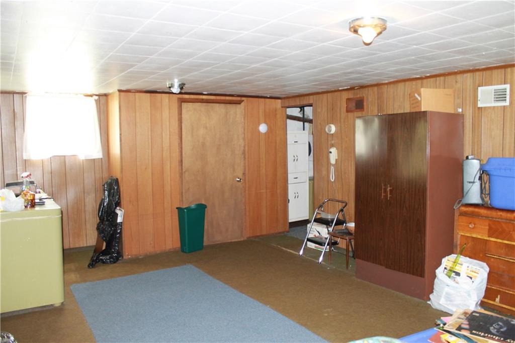 18 Oak Road West Middletown, PA 15379 - Photo 11 of 11 Lots of space and potential in this walkout basement. Walk through the doorway to the nearby laundry area with storage, oil heat, water heater, etc.