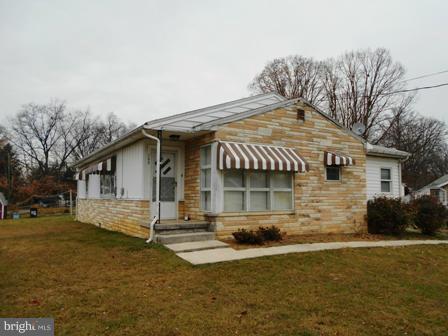 105 East Fourteenth Avenue Ranson, WV 25438 - Photo 1 of 17 a front view of a house with garden