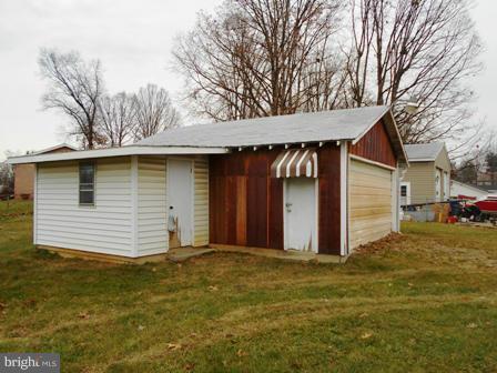 105 East Fourteenth Avenue Ranson, WV 25438 - Photo 2 of 17 a view of a house with a yard