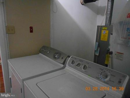 105 East Fourteenth Avenue Ranson, WV 25438 - Photo 11 of 17 a utility room with dryer and washer