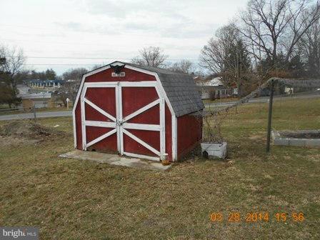 105 East Fourteenth Avenue Ranson, WV 25438 - Photo 15 of 17 a view of a backyard