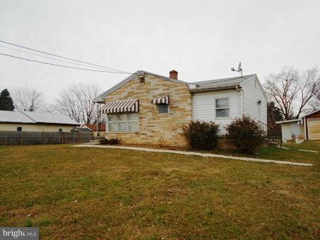 105 East Fourteenth Avenue Ranson, WV 25438 - Photo 16 of 17 a front view of a house with a yard