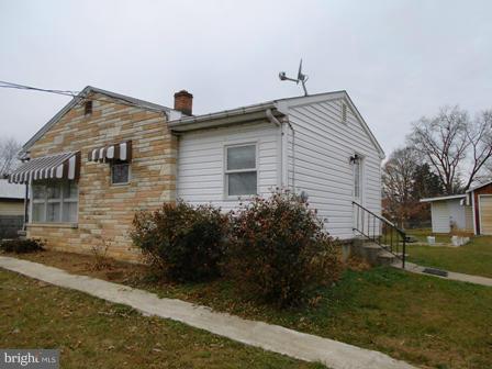 105 East Fourteenth Avenue Ranson, WV 25438 - Photo 17 of 17 a front view of a house with garden