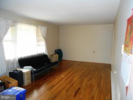 105 East Fourteenth Avenue Ranson, WV 25438 - Photo 3 of 17 a living room with furniture and a window
