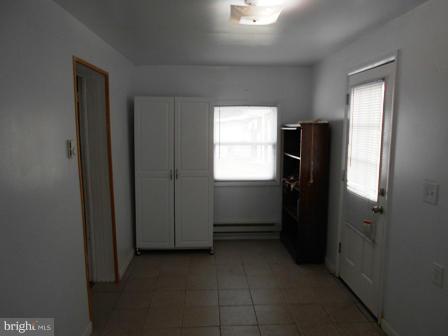 105 East Fourteenth Avenue Ranson, WV 25438 - Photo 8 of 17 a view of an empty room with a window