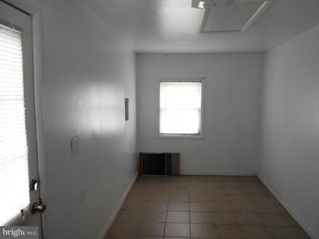 105 East Fourteenth Avenue Ranson, WV 25438 - Photo 9 of 17 an empty room with windows