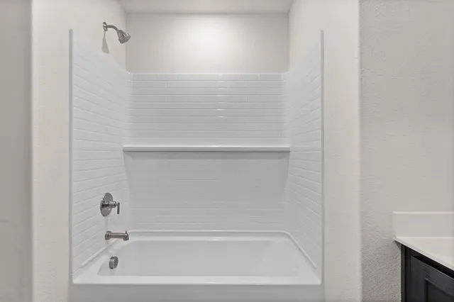 a view of bathroom with a sink toilet and tub