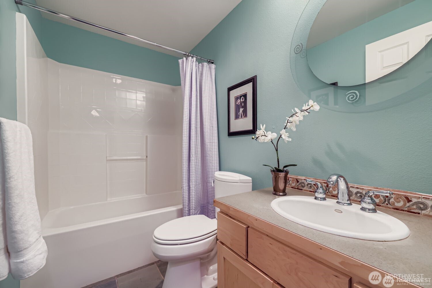 2622 East Madison Street Seattle, WA 98112 - Photo 26 of 38 a bathroom with a sink toilet and shower