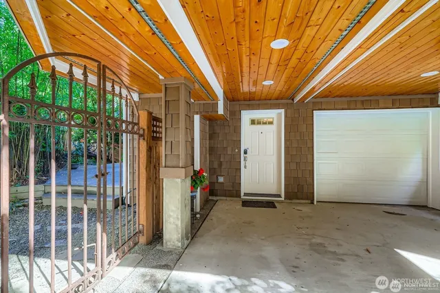 a view of a porch with wooden floor