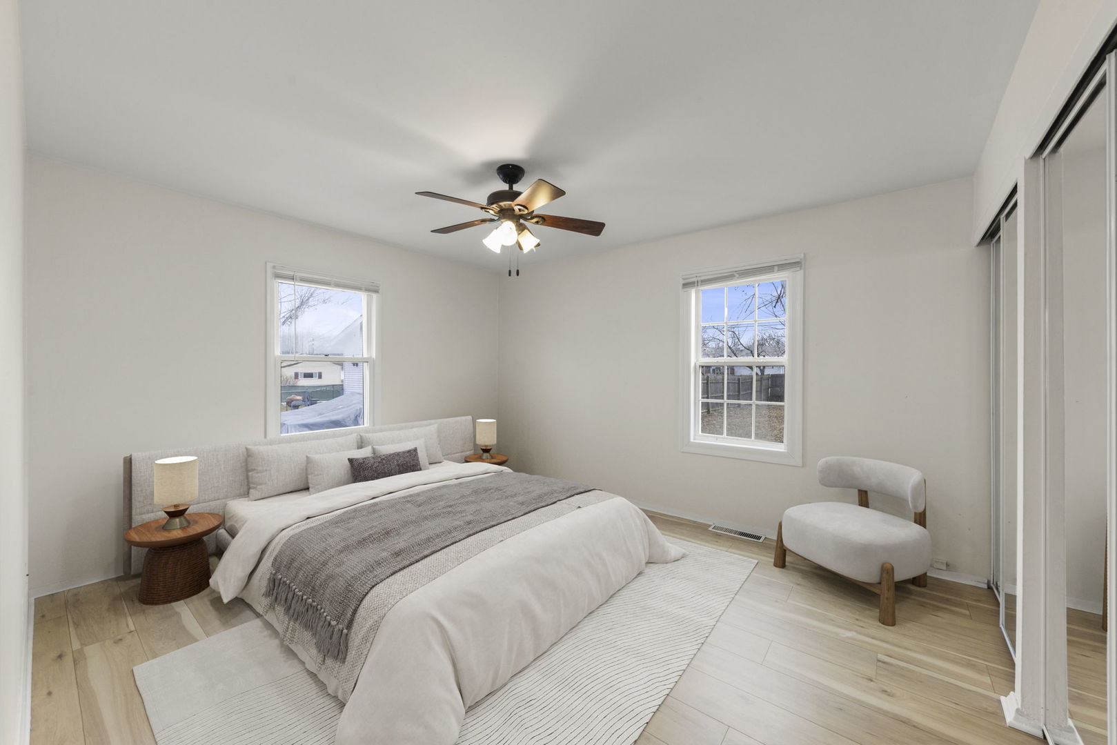 422 Best Avenue DeKalb, IL 60115 - Photo 12 of 34 a bedroom with a bed and a chandelier