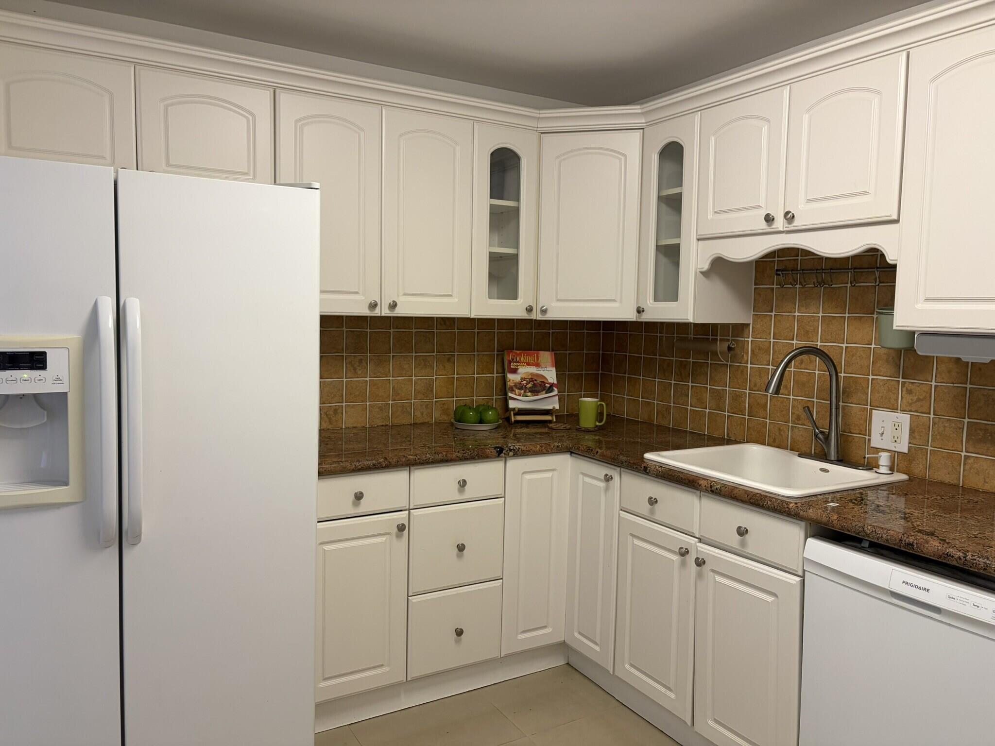 2940 North Course Drive, Unit 104 Pompano Beach, FL 33069 - Photo 1 of 19 kitchen