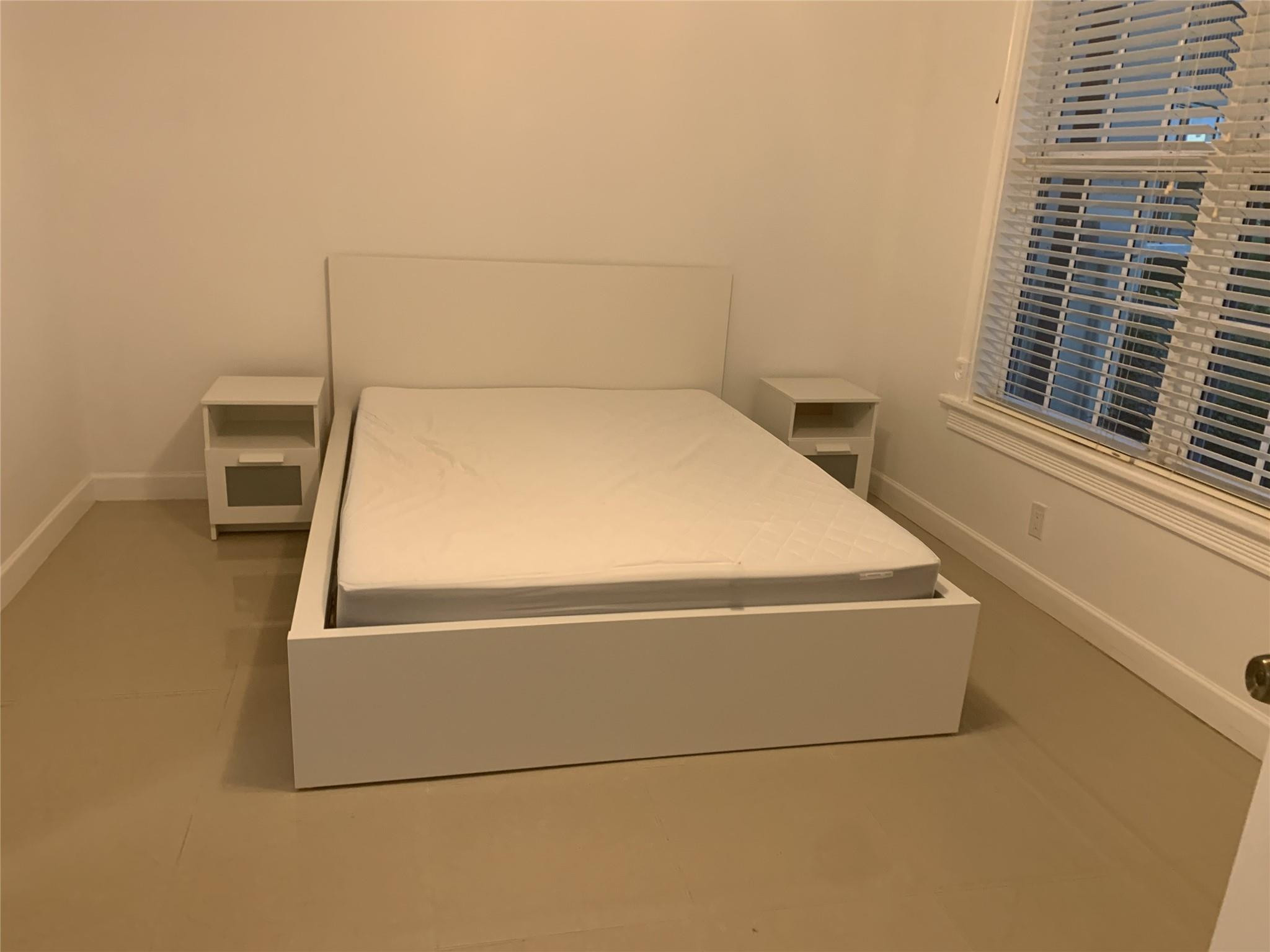 2940 North Course Drive, Unit 104 Pompano Beach, FL 33069 - Photo 11 of 21 Guest Bedroom