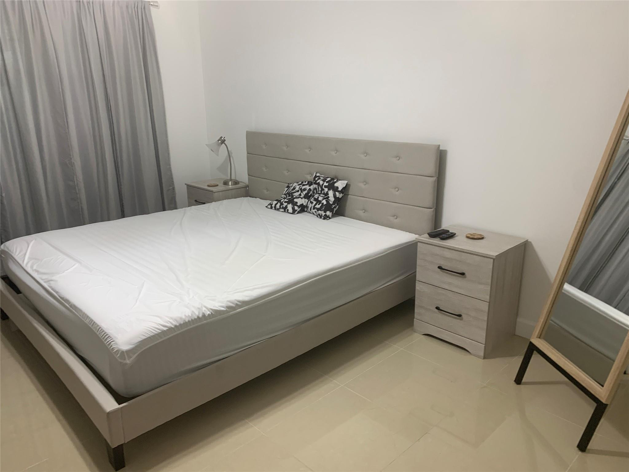 2940 North Course Drive, Unit 104 Pompano Beach, FL 33069 - Photo 2 of 21 Primary Bedroom