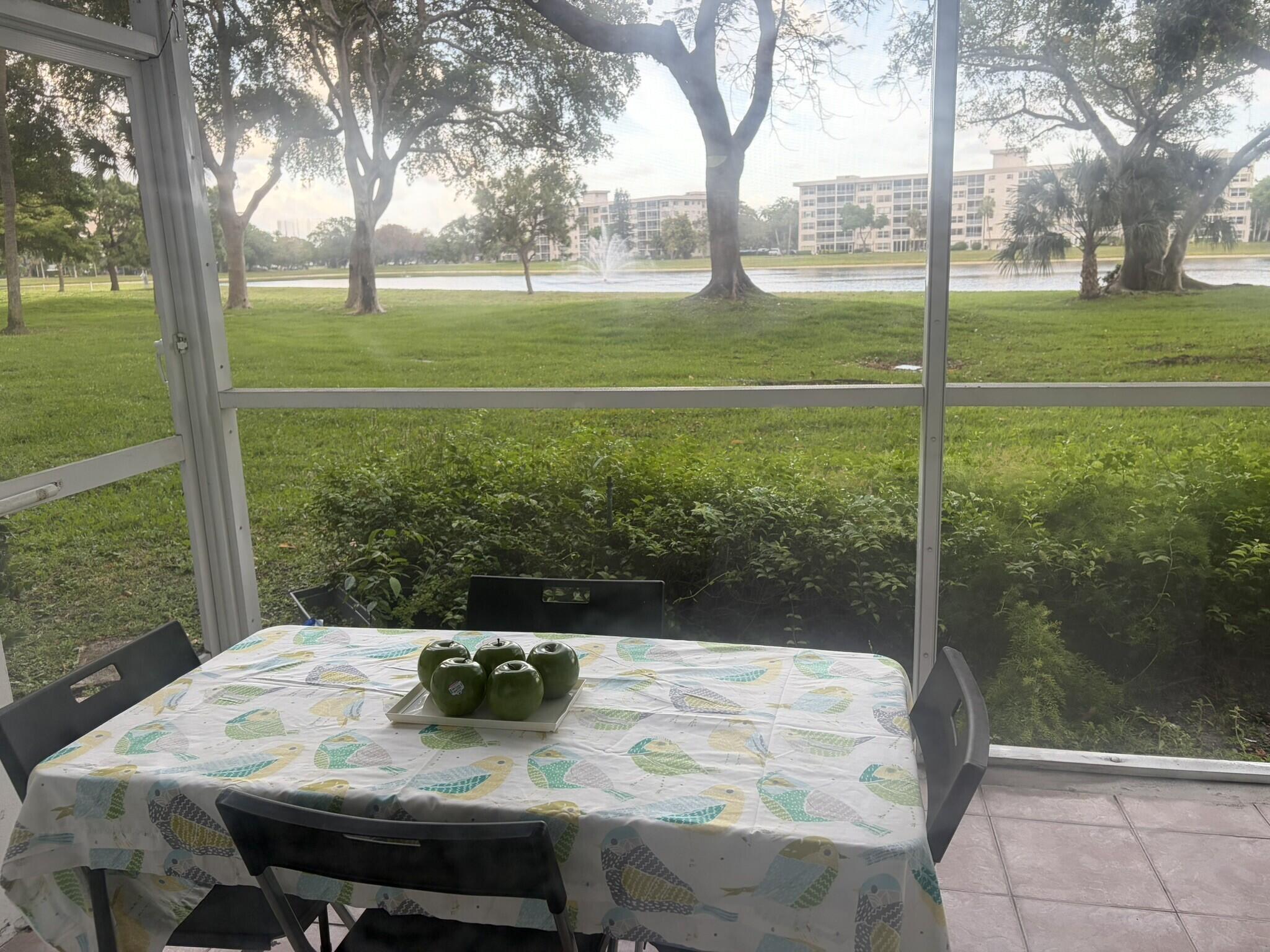2940 North Course Drive, Unit 104 Pompano Beach, FL 33069 - Photo 9 of 19 enclosed-patio