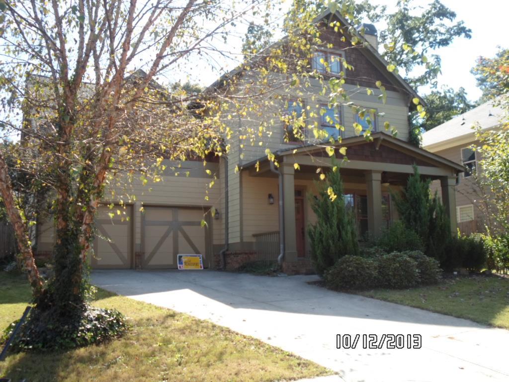 2401 Boulder Road Southeast, Unit 8 Atlanta, GA 30316 - Photo 1 of 1 a view of a house with a yard and tree s
