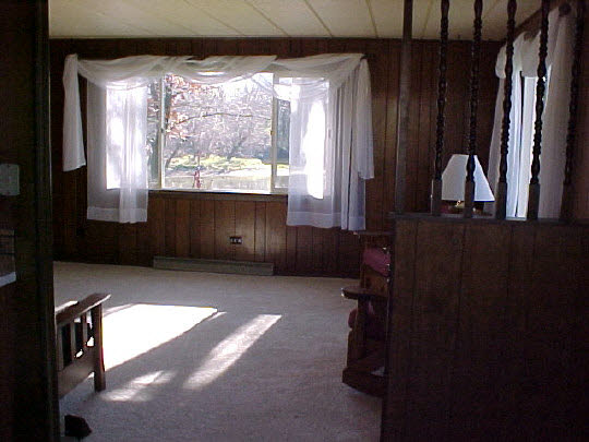 2719 South Snyder Road Oregon, IL 61061 - Photo 2 of 5 a living room with furniture and a large window