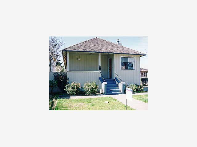 115 Bloomfield Road Burlingame, CA 94010 - Photo 1 of 1 a view of a house with a yard