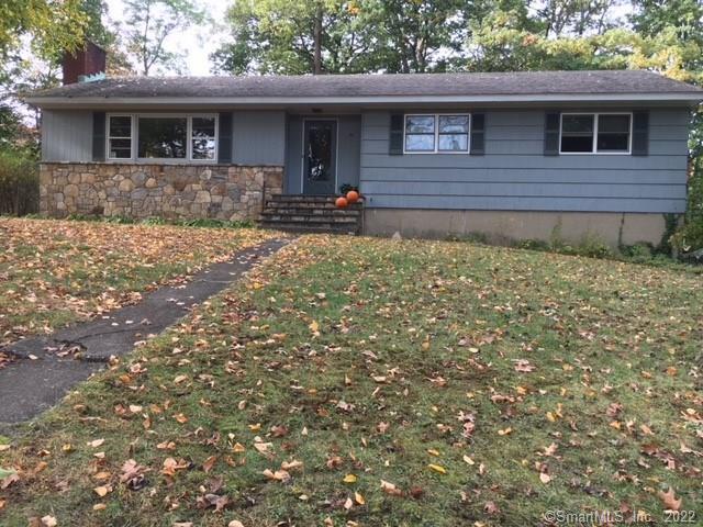 52 Greenleigh Road Fairfield, CT 06825 - Photo 1 of 1 a front view of house with yard