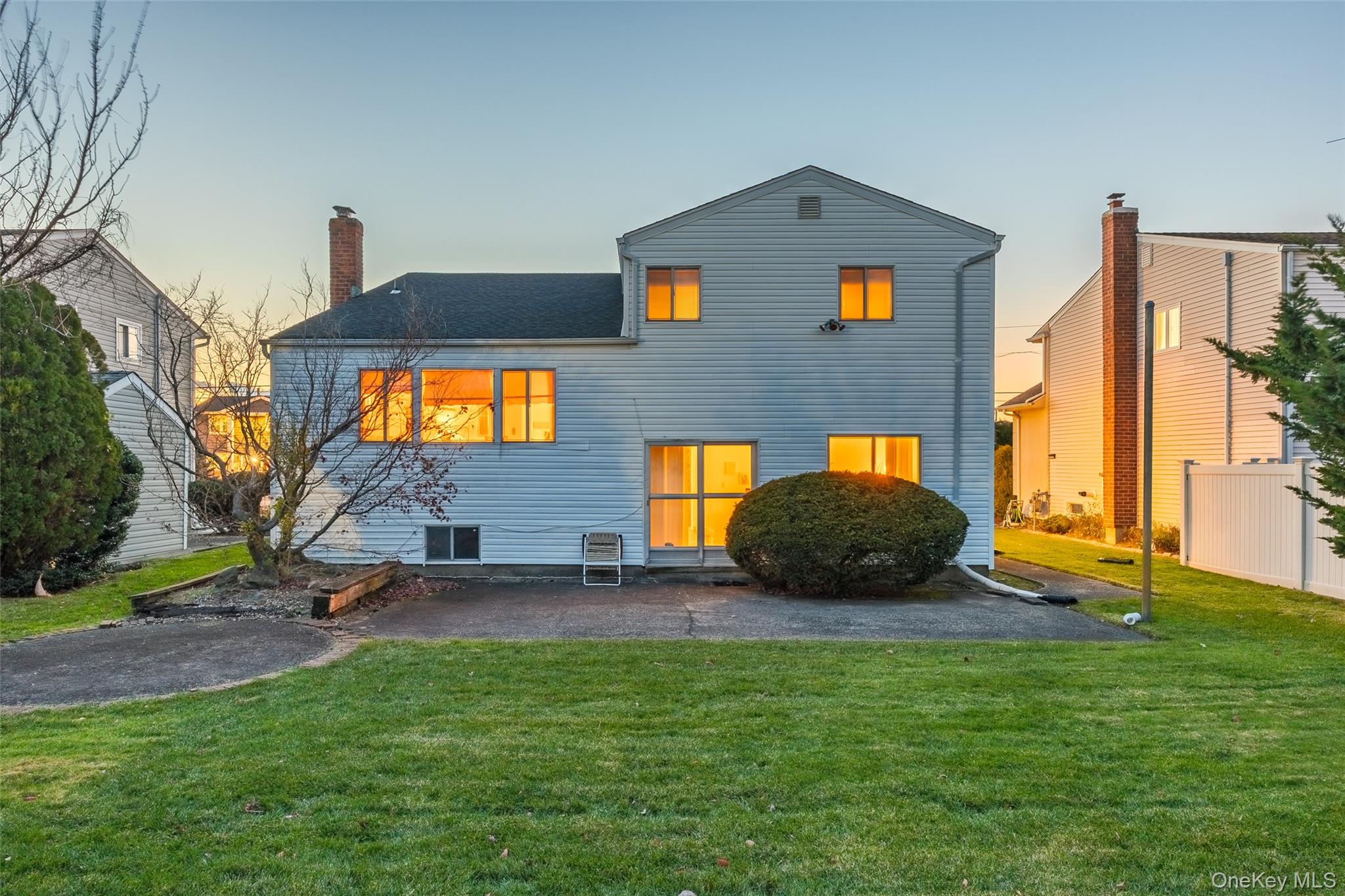 2929 Mandalay Beach Road Wantagh, NY 11793 - Photo 20 of 26 a view of swimming pool with a yard