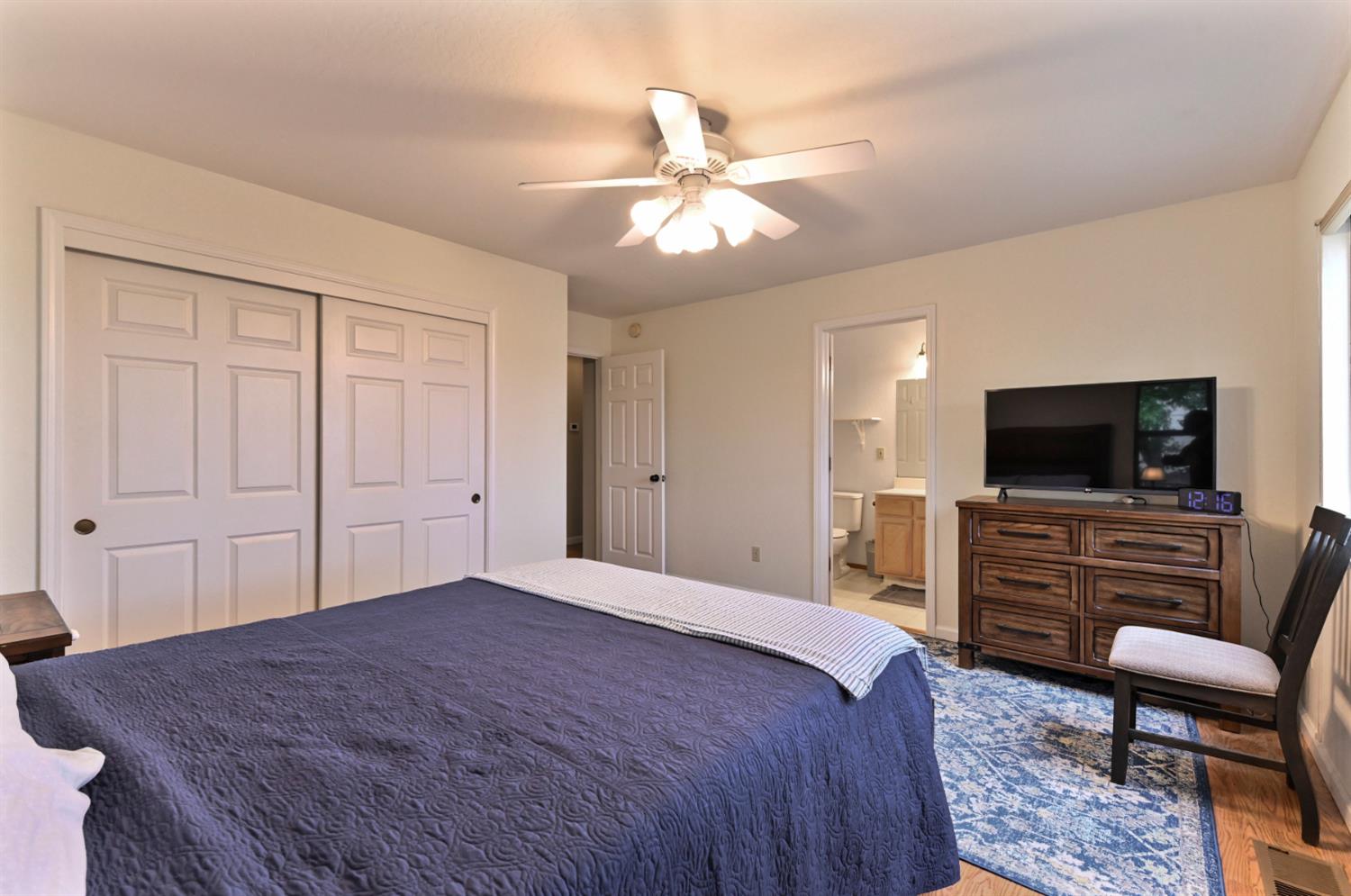 147 Rocky Ridge Lane Angels Camp, CA 95222 - Photo 29 of 61 a bedroom with a bed and furniture