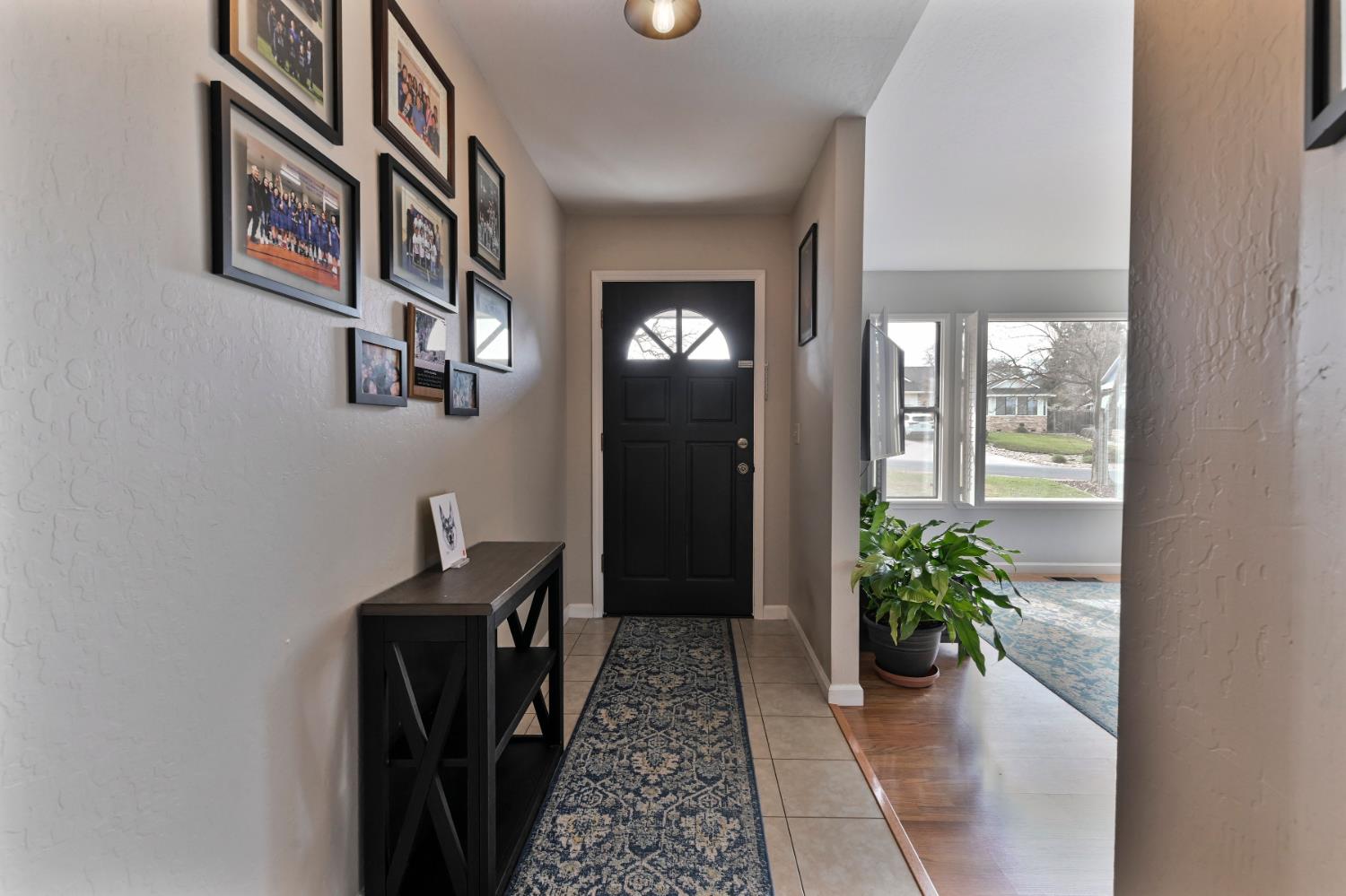 147 Rocky Ridge Lane Angels Camp, CA 95222 - Photo 40 of 61 a view of a hallway with paintings on the wall