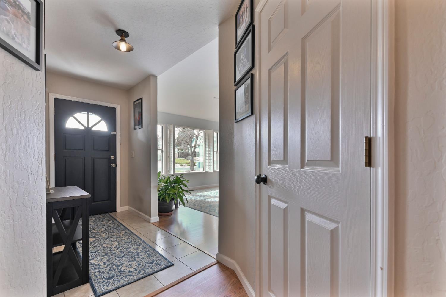 147 Rocky Ridge Lane Angels Camp, CA 95222 - Photo 41 of 61 a view of a hallway and a livingroom with furniture and front door