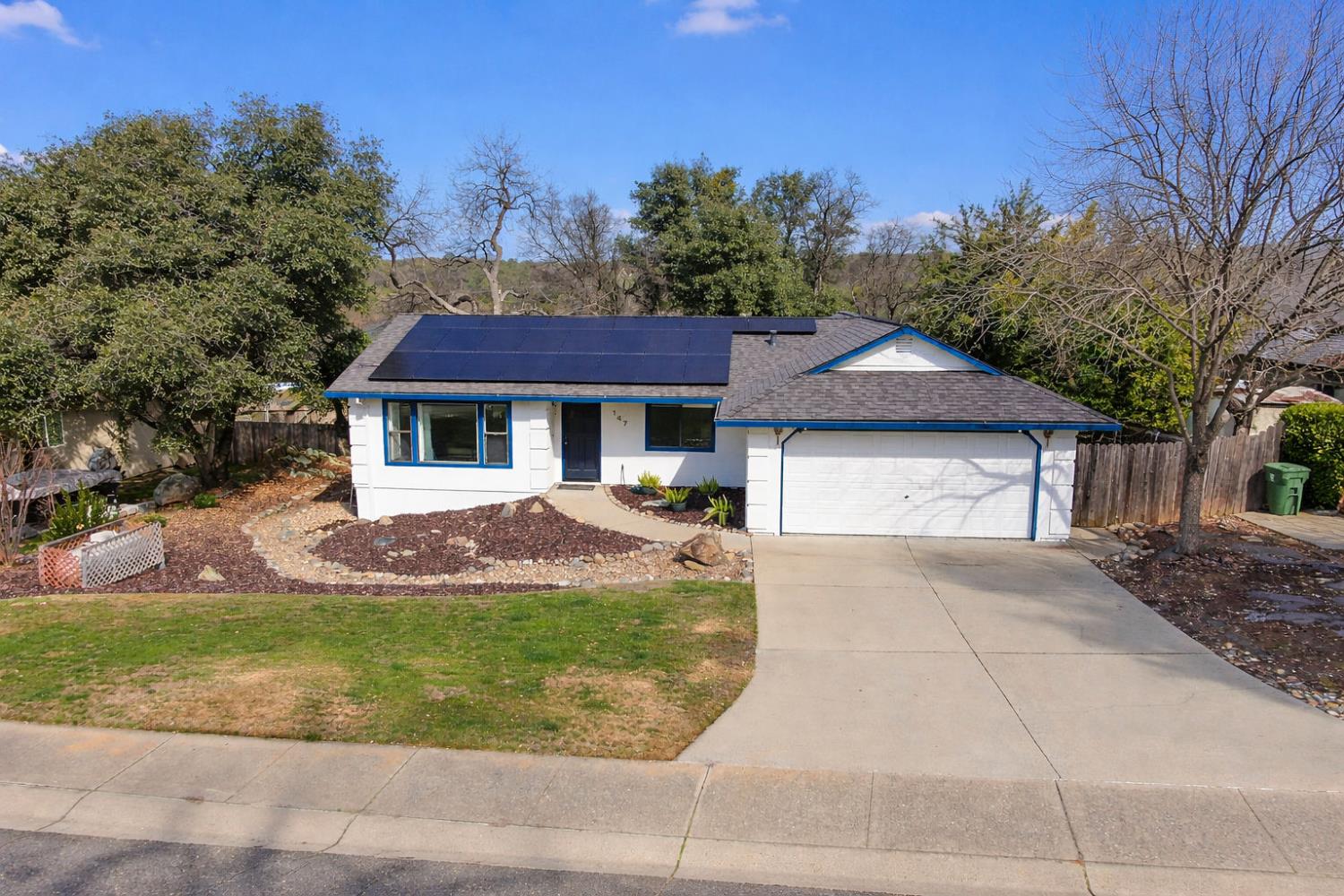 147 Rocky Ridge Lane Angels Camp, CA 95222 - Photo 60 of 61 a front view of a house with yard and green space