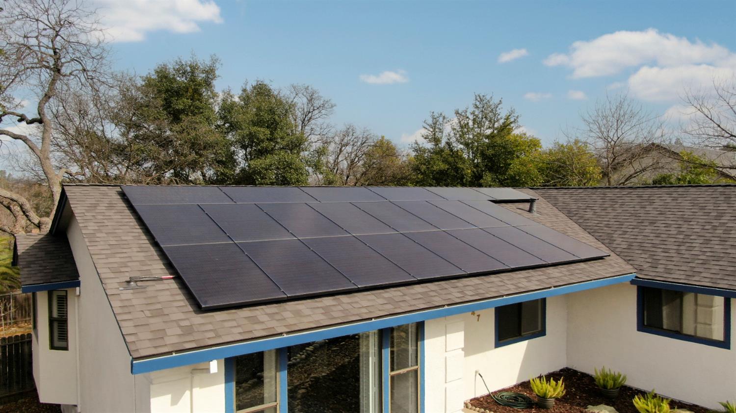 147 Rocky Ridge Lane Angels Camp, CA 95222 - Photo 6 of 61 a aerial view of a house with a yard and balcony