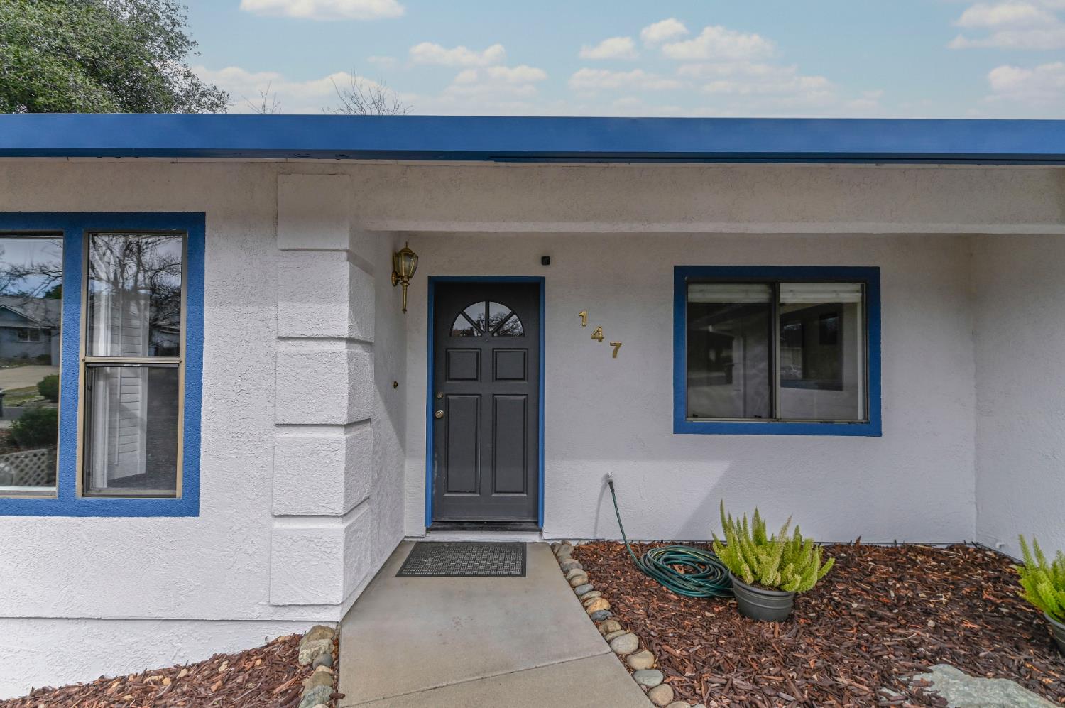 147 Rocky Ridge Lane Angels Camp, CA 95222 - Photo 10 of 61 a front view of a house