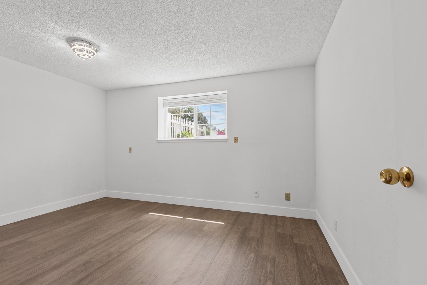 8310 Crotty Way Valley Springs, CA 95252 - Photo 41 of 61 New flooring in bedroom #3